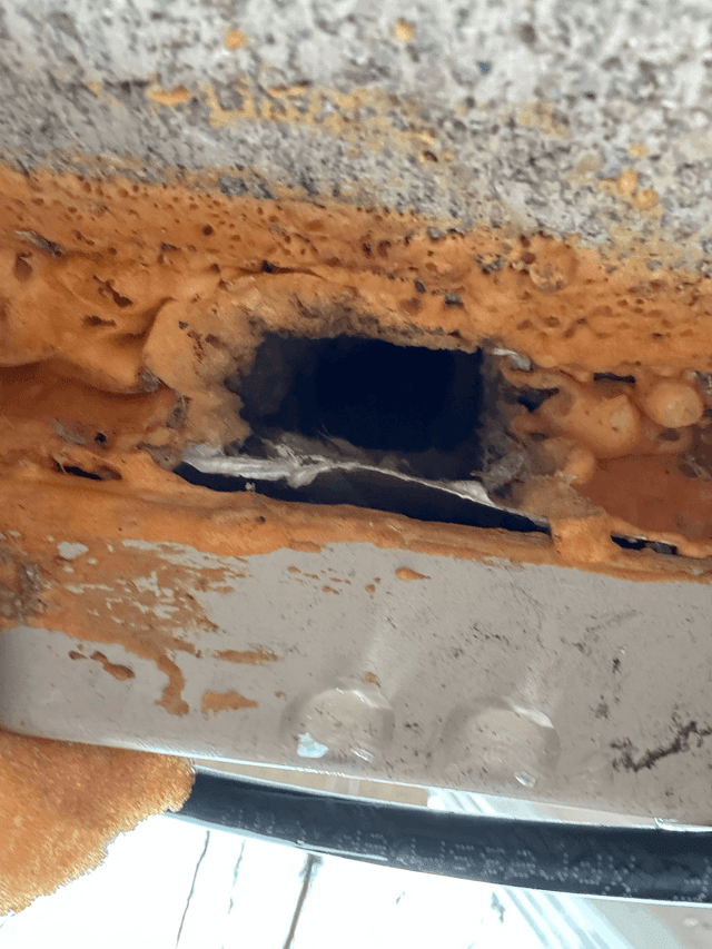 Hole in the foundation in a wall